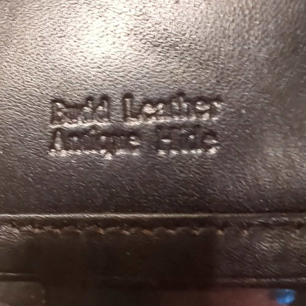 Two midi Budd fine leather pocket diary agenda books with snap closure.